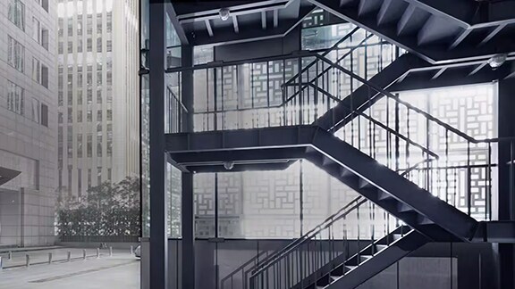 Front view of a building from the sidewalk