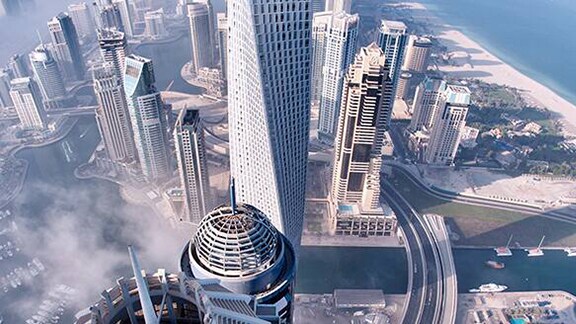 Aerial view of the city skyscrapers from the clouds