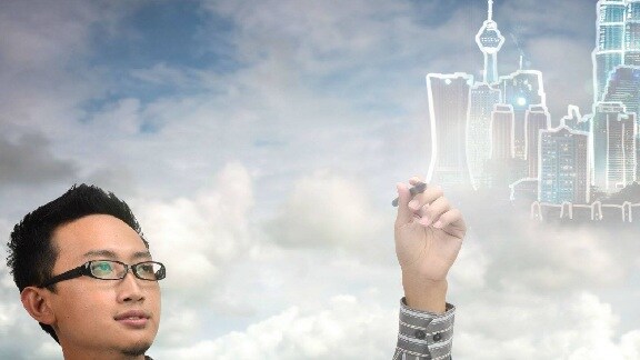 A person with design services graphics