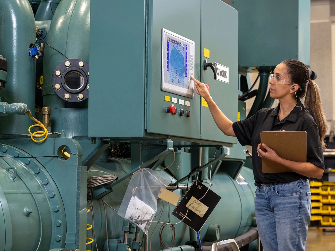 A lady worker operating the installed chiller
