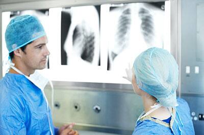 Doctors discussing about X ray