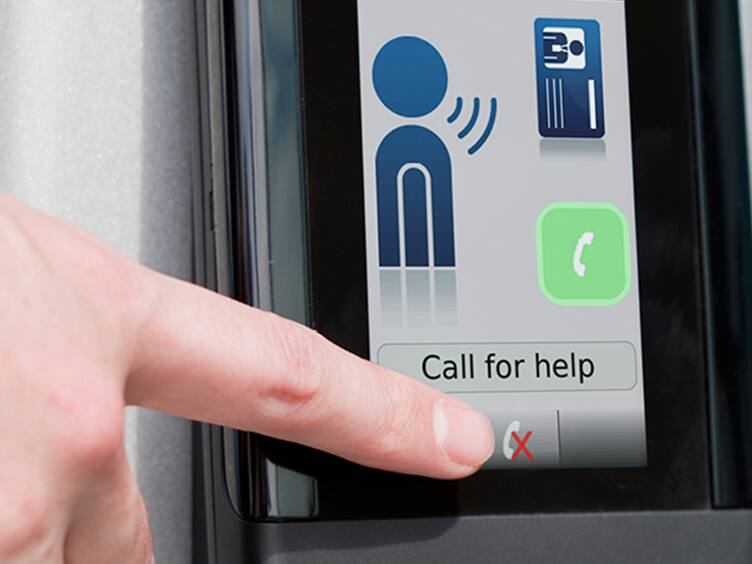 A hand reaching out to touch the call for help button on a phone