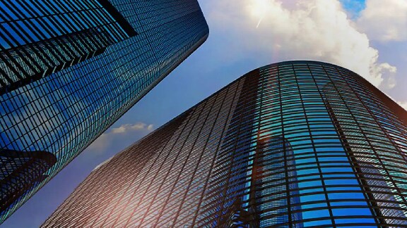Frog's eye view of skyscrapers on a sunny day