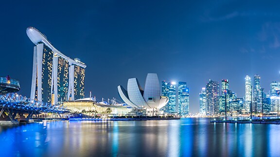 A metropolitan skyline at dusk