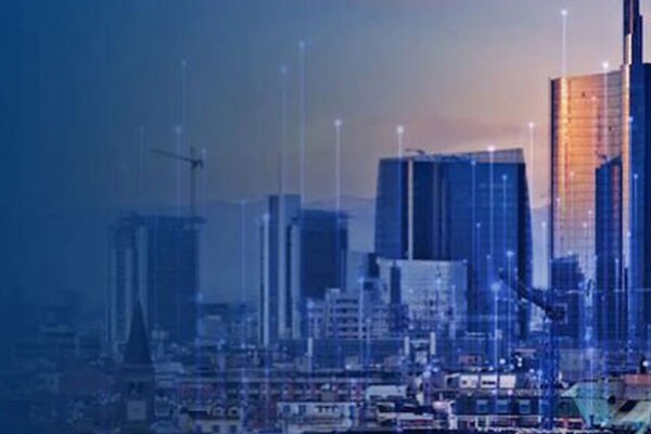 Aerial view of the city with skyscrapers overlaid with graphics of transmission nodes