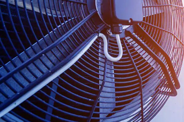 close up of a wall mount fan